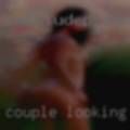 Couple looking girls